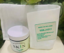 Load image into Gallery viewer, Gift set of organic face cleansing balm with vitamin e, sunflower, golden jojoba & castor oils and a 100% Irish linen facecloth woven in Wexford, in a sustainable linen/cotton gift bag with an Irish dried flower, ready to gift - no wrapping necessary !