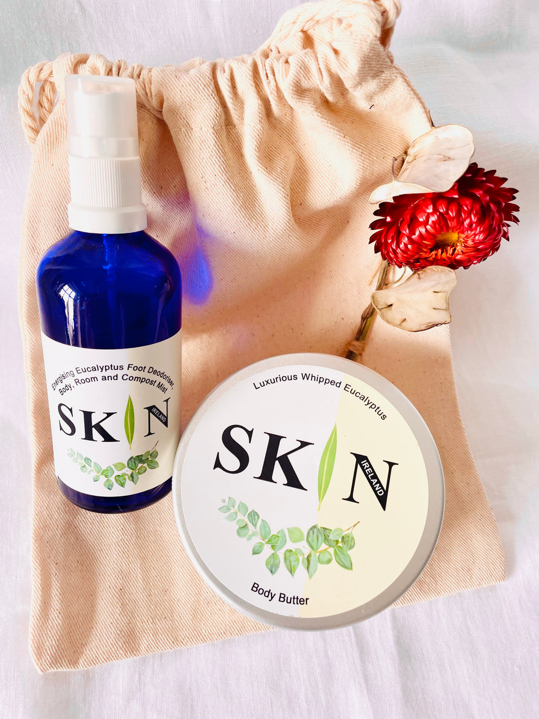 Gift Bag of Large (200ml) Luxurious Eucalyptus Body Butter and Energising Eucalyptus Body and Room Mist. Gift bag features Irish grown and naturally dried flower, hand-sewn onto linen bag. Ready to gift - no wrapping necessary!
