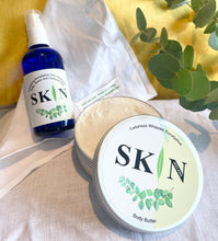 Load image into Gallery viewer, Gift Bag of Large (200ml) Luxurious Eucalyptus Body Butter and Energising Eucalyptus Body and Room Mist. Gift bag features Irish grown and naturally dried flower, hand-sewn onto linen bag. Ready to gift - no wrapping necessary!
